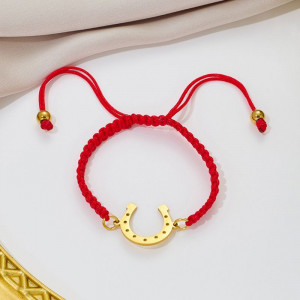 Браслет плетеная нить с золотистой подковой CJQ92937