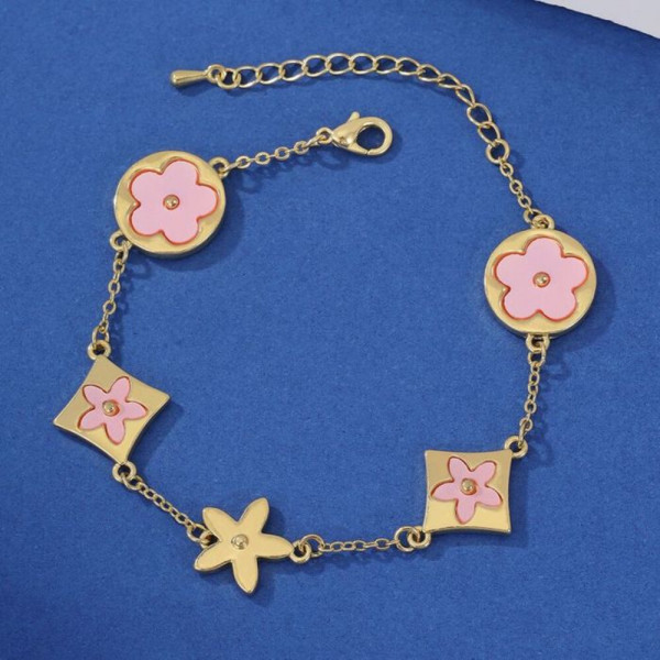 Золотистый браслет с подвесками в виде белых цветов CJ22161