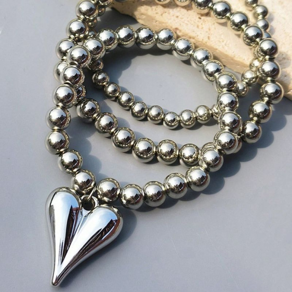 Браслет многорядный из стальных бусин с бантом CJN32391