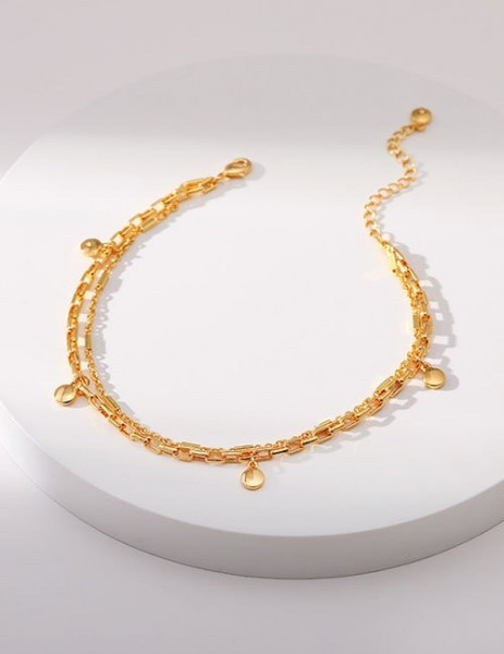 Браслет с асимметричными золотистыми деталями Z29626