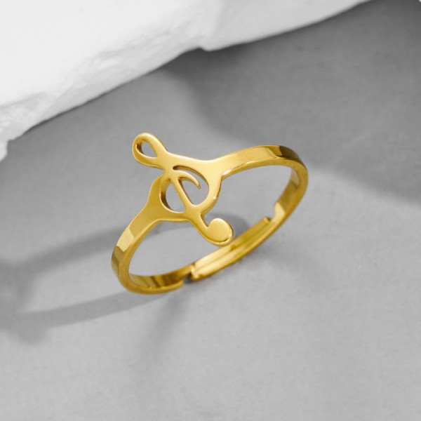 Золотистое кольцо со скрипичным ключом CJH62218