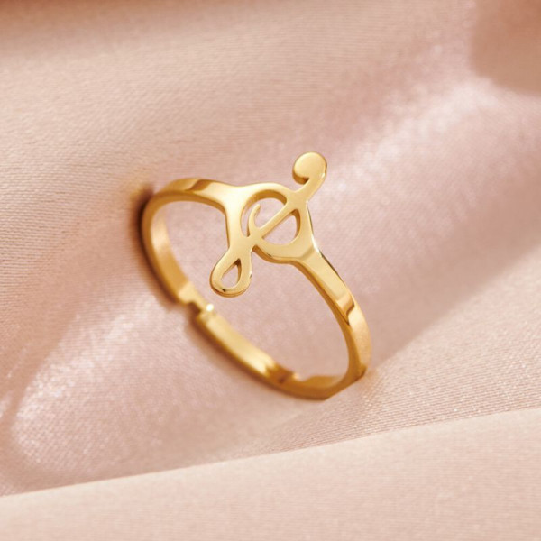 Золотистое кольцо со скрипичным ключом CJH62218