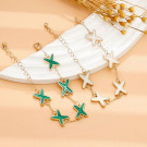 Браслет цепочка с зелеными четырехлистниками CJM40419