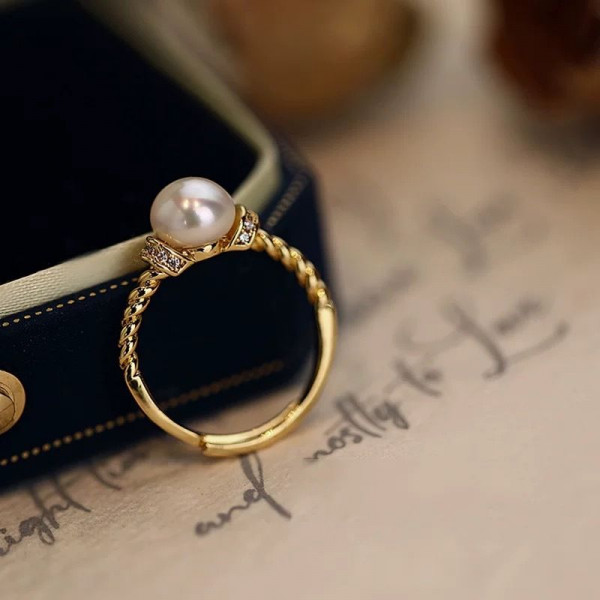 Кольцо из меди с жемчужиной на фактурном ободке 1J12245CJJ