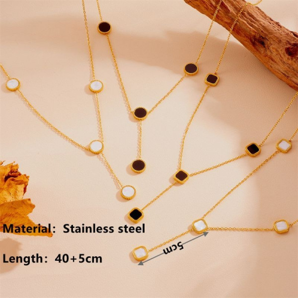 Золотистое колье-галстук с черными четырехлистниками CJG27218