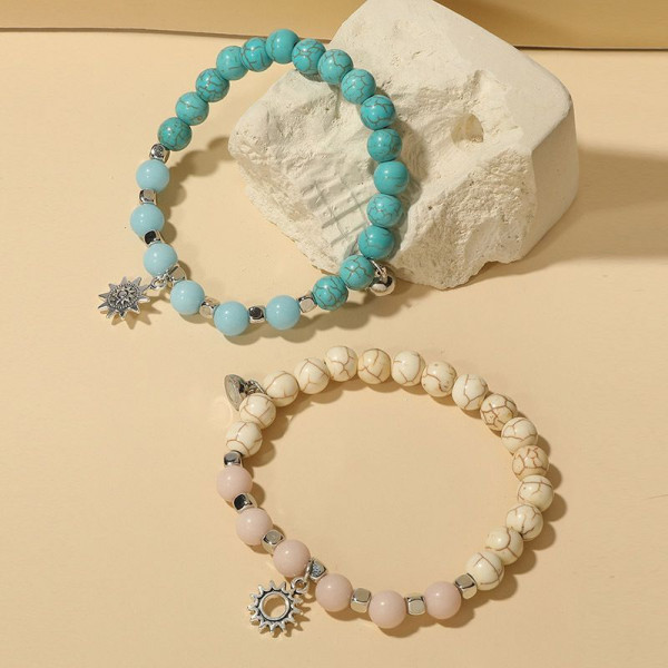 Парные браслеты солнечный берег с подвесками-цветами R19776