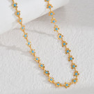 Тонкая золотистая цепочка с цветочными звеньями CJH59669