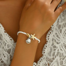 Браслет из жемчуга с золотистой звездой CJN34465