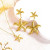Золотистые серьги-пусеты Морские звезды CJH15082