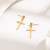 Золотистые висячие серьги Кресты CJH23995