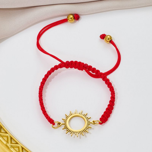 Браслет плетеная нить с золотистым ажурным солнцем CJQ65913