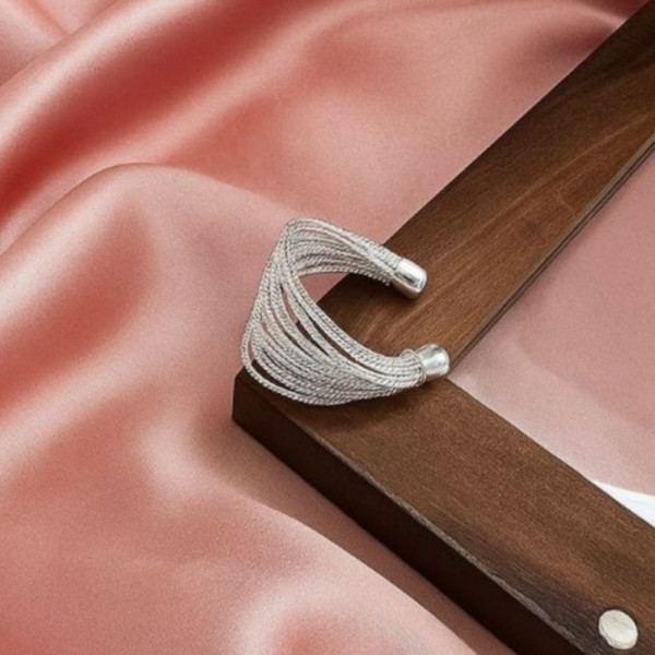 Многослойное кольцо с дорожками из кристаллов 1J12248CJJ