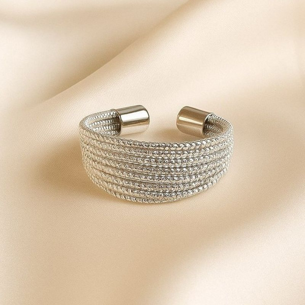 Многослойное кольцо с дорожками из кристаллов 1J12248CJJ