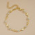Браслет цепочка с золотистыми цветами CJC97234