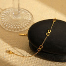 Браслет цепочка с символом бесконечности и сияющими кристаллами CJL47637