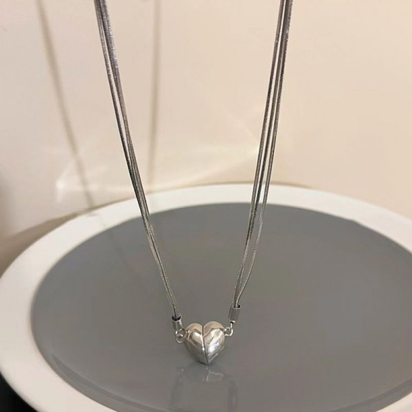 Многослойное колье из тонких цепей с сердцем CJH55684