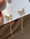 Серьги-гвоздики с золотистыми бабочками и нитями U99022