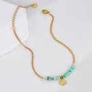 Золотистая цепочка с бирюзовыми вставками и ракушкой CJH59627