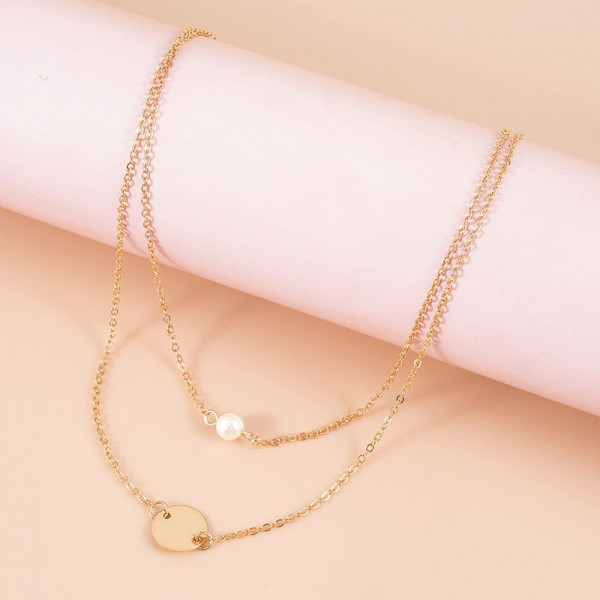 Двойная золотистая цепочка с жемчужиной и диском CJH35176