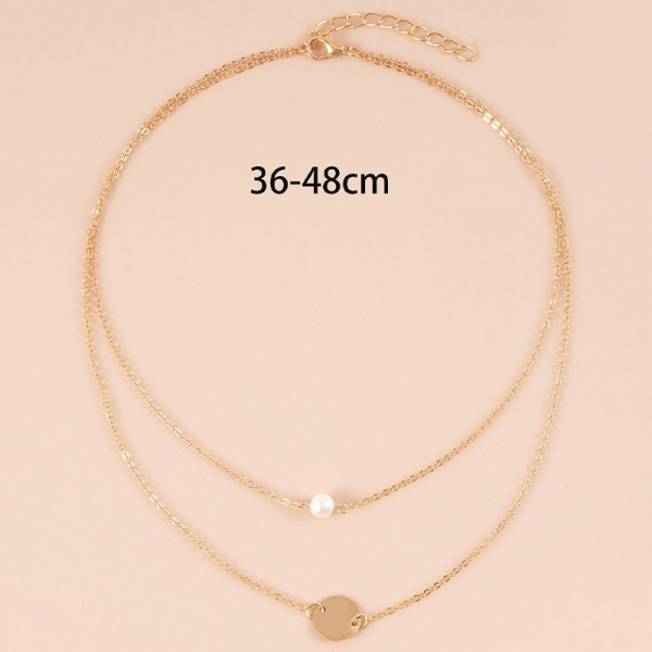 Двойная золотистая цепочка с жемчужиной и диском CJH35176