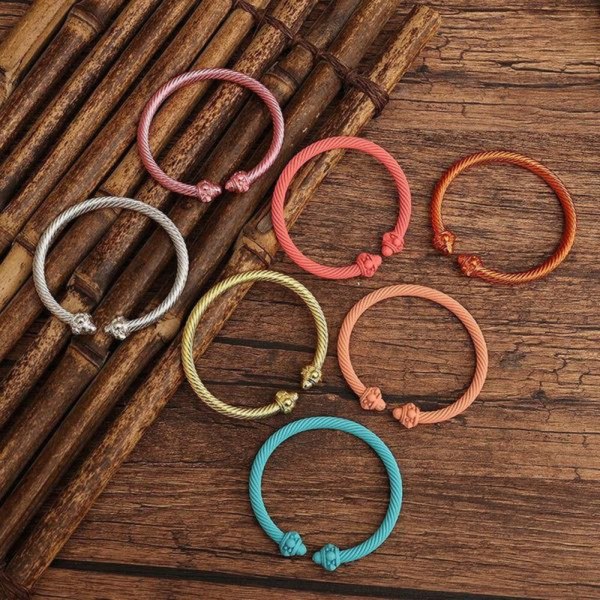 Браслет жесткий разомкнутый с узелками CJH58825