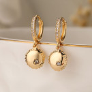 Серьги-кольца с рельефными дисками N99092