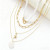 Четырехслойное колье с белым чокером и подвеской-ракушкой CJR81451