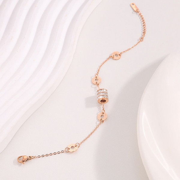 Браслет-цепочка с цилиндрическим элементом и монетами CJH59801