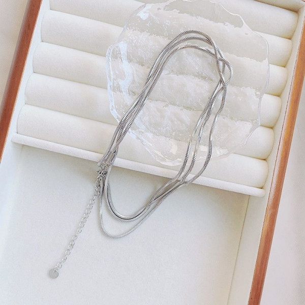 Золотистое многослойное колье с каплей CJL79595