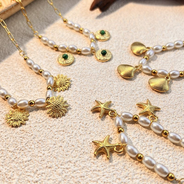 Золотистая цепочка с ракушками и жемчугом CJM18966