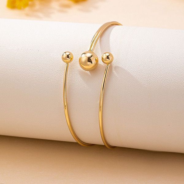 Браслет жесткий разомкнутый с шариками на концах CJP54226