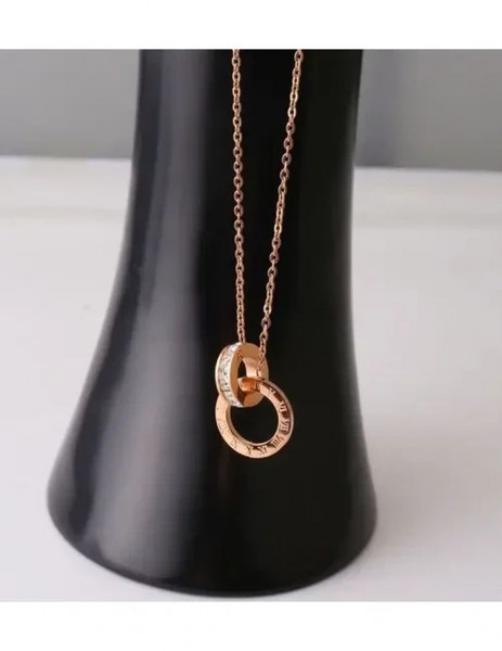 Двойная цепочка с подвеской в виде переплетенных колец с фианитами J10085CJJ