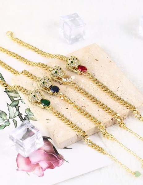 Золотистый браслет с пантерой и синим кристаллом L80276