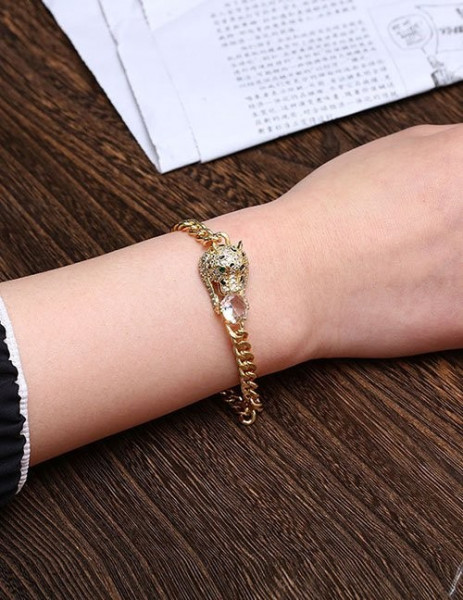 Золотистый браслет с пантерой и синим кристаллом L80276