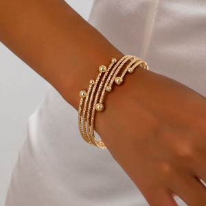 Браслет жесткий многорядный с декоративными узелками CJQ22072