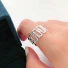 Ажурное разомкнутое кольцо с геометрическим плетением CJC99291