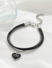 Браслет из черного шнура с сердцем L75928