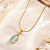Золотистое стальное колье с подвеской-каплей CJG24897
