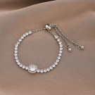 Браслет-дорожка с центральным жемчугом на затяжке M95840