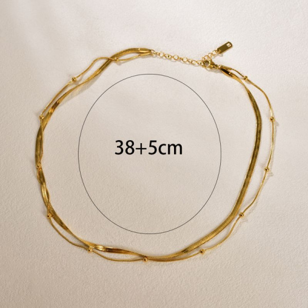 Золотистое двухслойное колье из тонких цепей с жемчужиной CJP75744