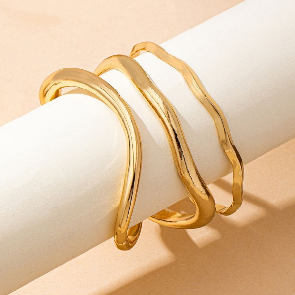 Браслет жесткий разомкнутый из трех переплетенных линий CJQ22074