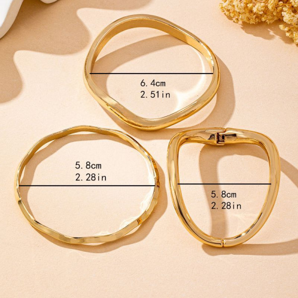 Браслет жесткий разомкнутый из трех переплетенных линий CJQ22074