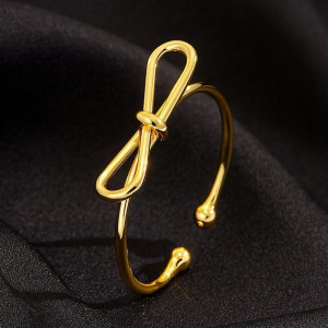 Кольцо с золотистым покрытием в форме изящного банта 1J12461CJJ