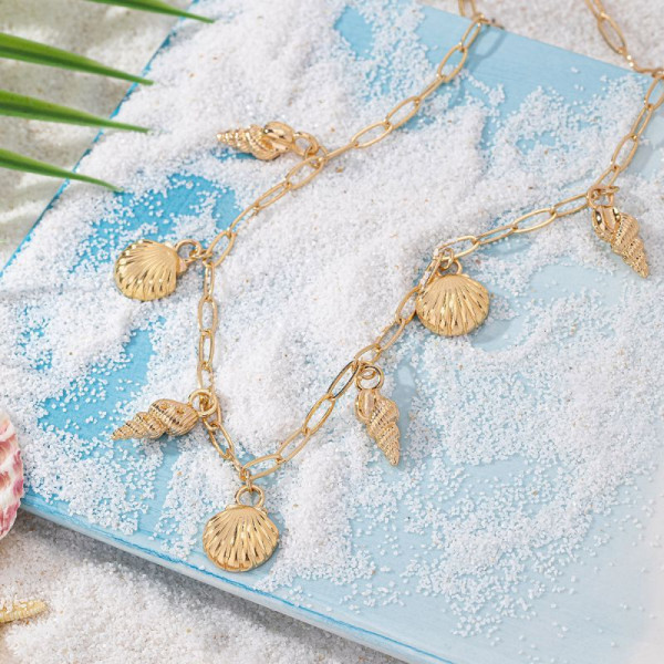 Золотистое колье с морскими звездами и ракушками CJM14371