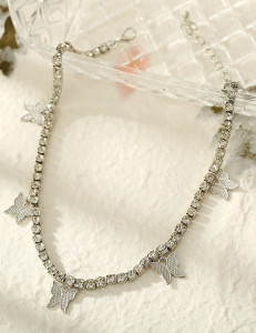 Тонкое серебристое колье с мелкими подвесками-звездами P33504