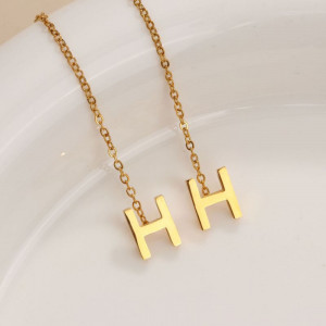 Золотистые серьги-протяжки Буква H CJH32655