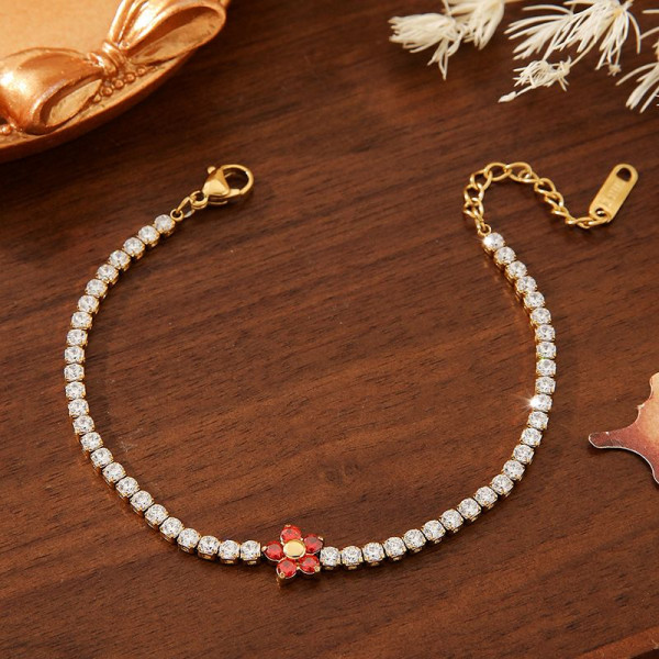 Браслет-дорожка золотистый с изящным цветком CJN91585