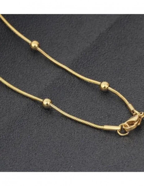 Золотистая цепочка с декоративными шариками-бусинами по всей длине J10095CJJ