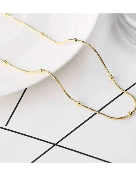 Золотистая цепочка с декоративными шариками-бусинами по всей длине J10095CJJ