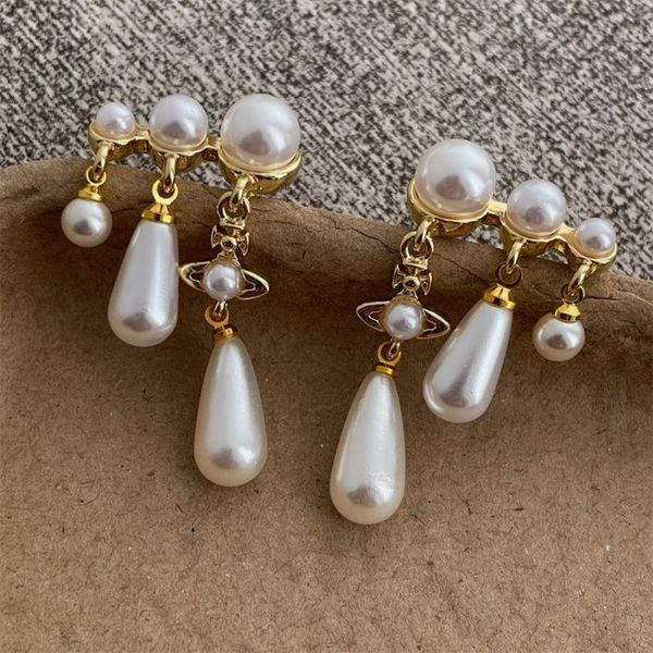 Серьги пусеты с жемчужными гроздьями и крупными каплями CJL14692